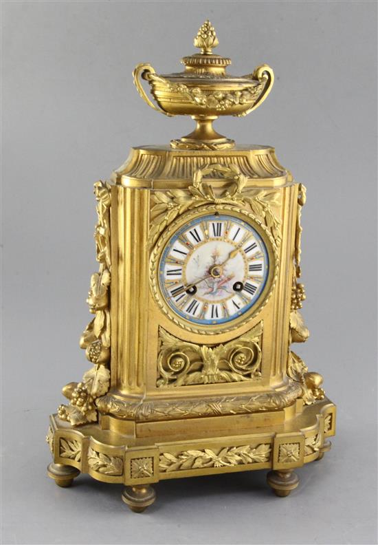 A third quarter of the 19th century French porcelain mounted ormolu mantel clock, height 14.5in.